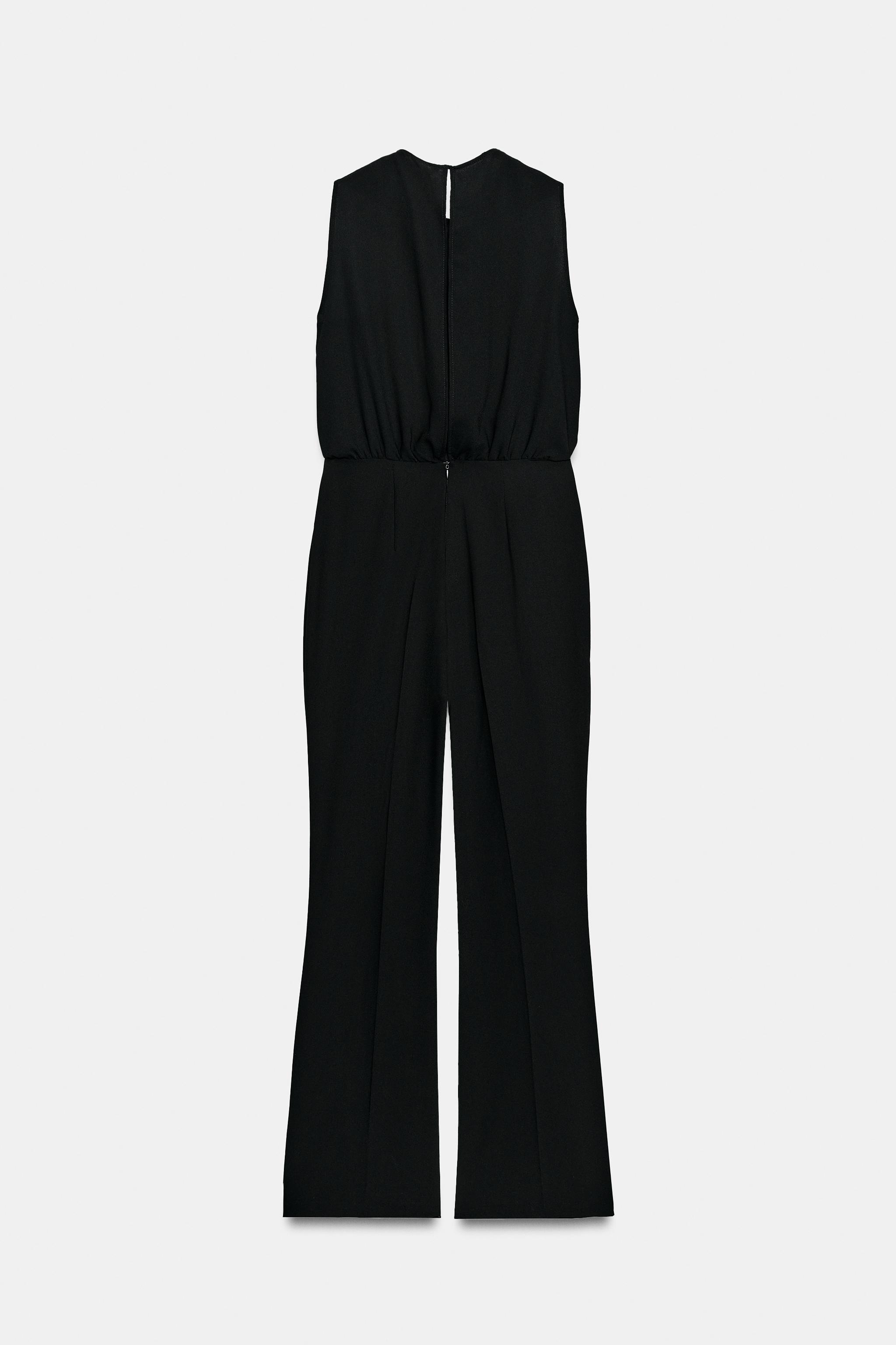 TWISTED NECK FLARE JUMPSUIT